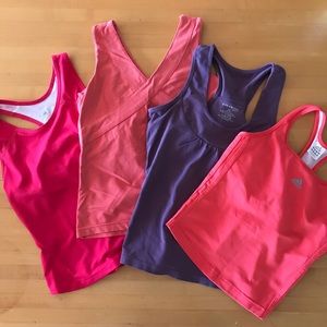 Set -4 fitness tank tops: Adidas,New Balance& more